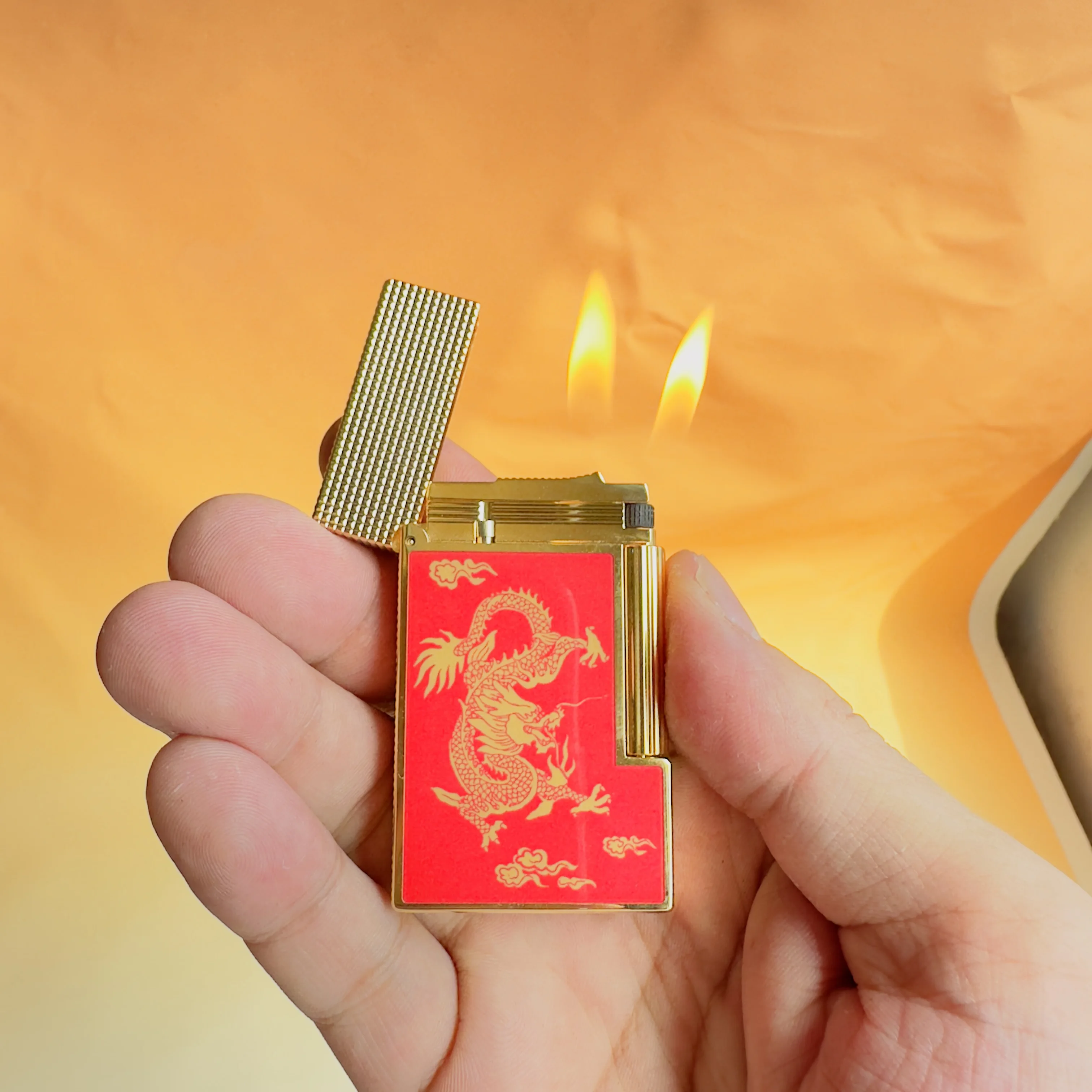 

Custom-designed lighter with a golden dragon pattern, comes with a set of custom-designed smoking accessories.