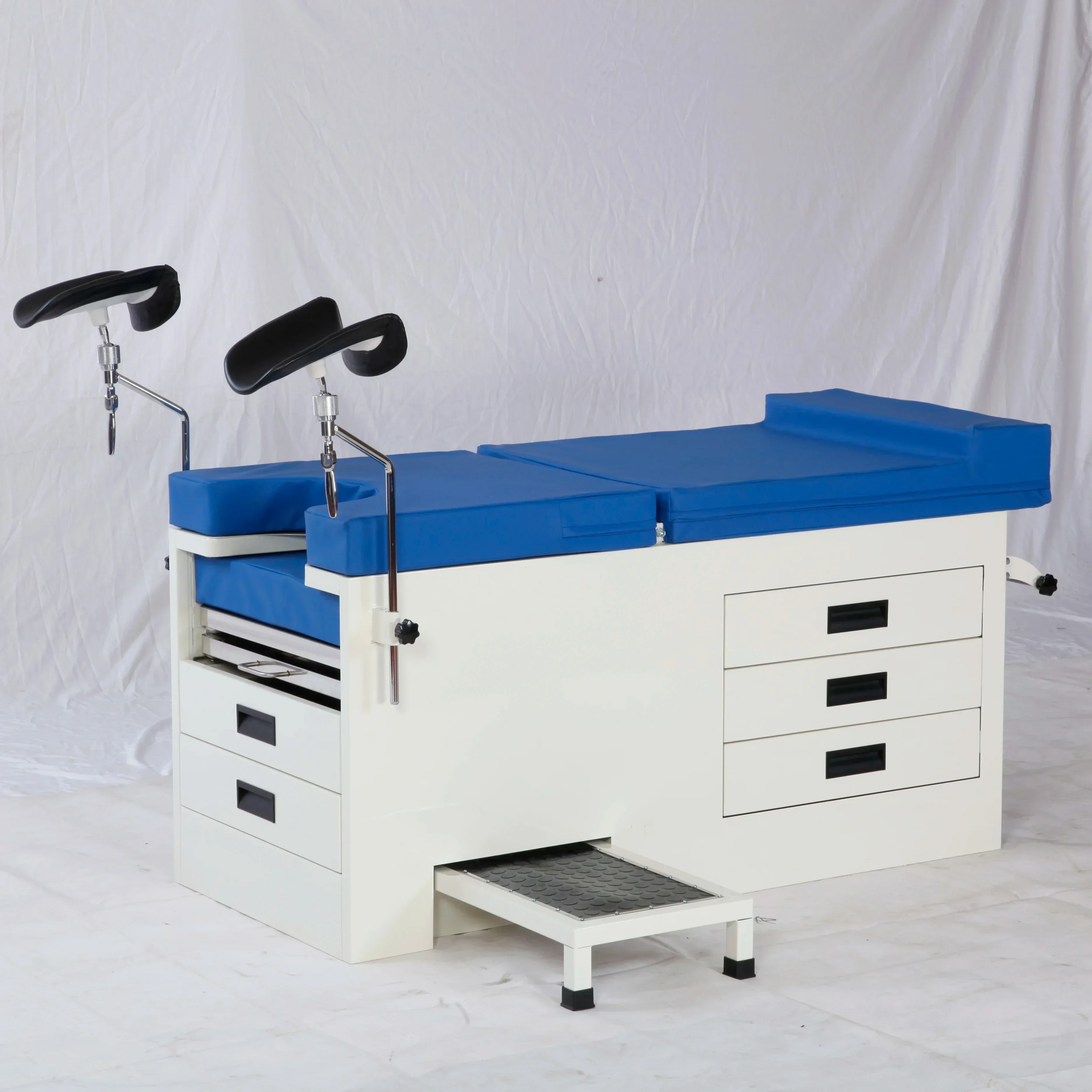 Hot SalesBest-selling Instruction Of Manual Obstetric Bed Medical Gynaopathy Exam Table With Stirrups
