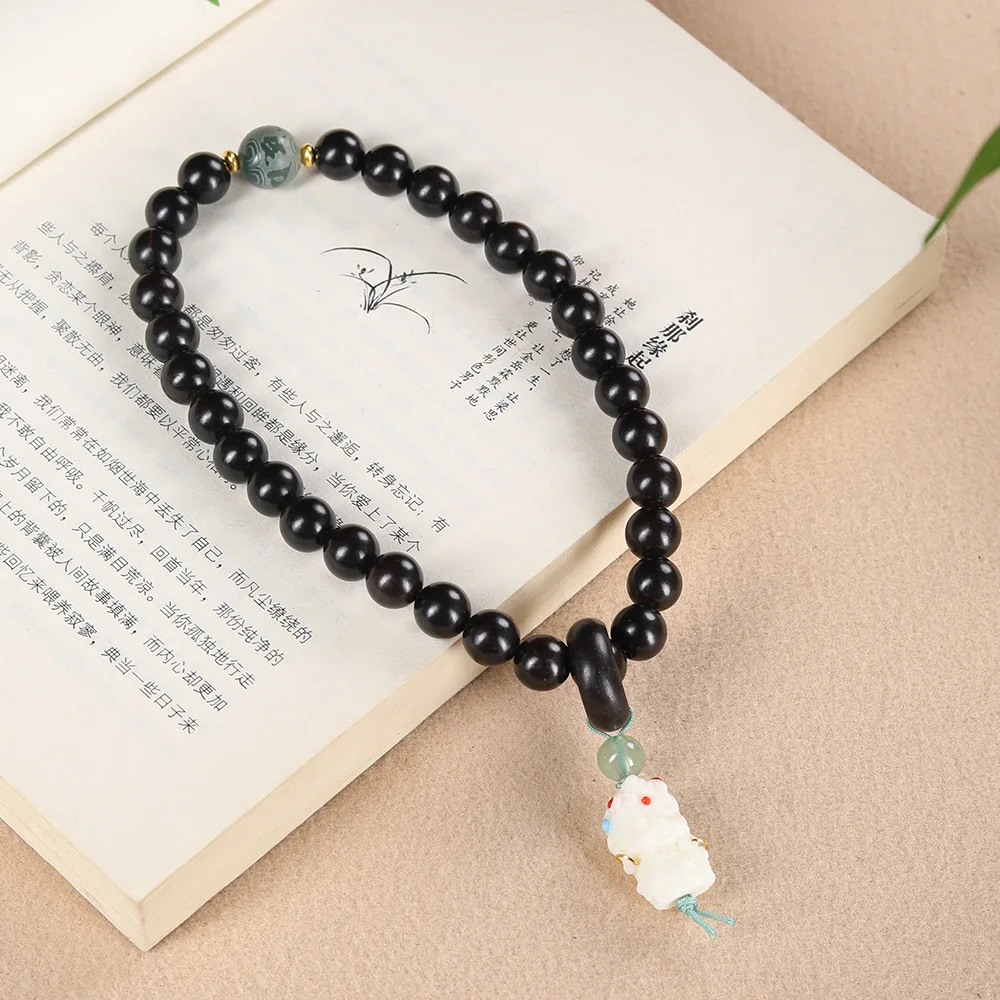 

Single Circle Six Syllable Mantra Prayer Beads Handheld Rosary Made of Purple Sandalwood and Ebony for Men and Women Gifts