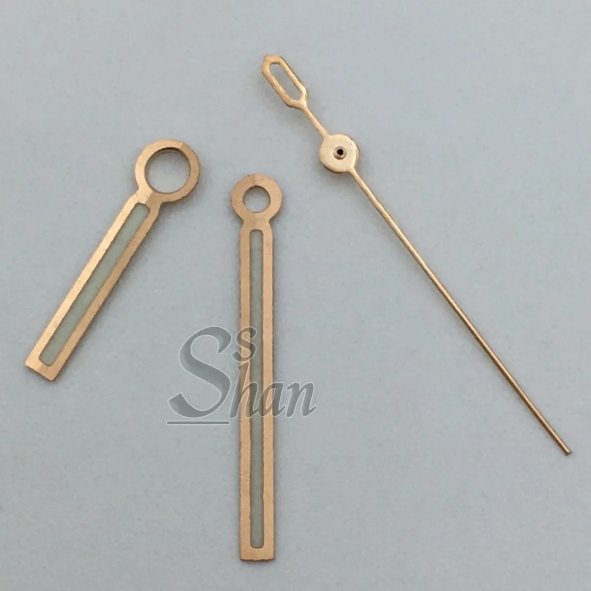 Wysokiej jakości wskazówki zegarkowe NH35 12,5*12*8mm z zielono-niebieską luminescencją, pasujące do mechanizmów NH35 i NH36, złote, srebrne, różowe złoto.