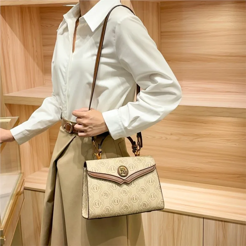 

Light luxury brand women's handbag 2025 new fashionable high-end single shoulder portable niche design exquisite crossbody bag