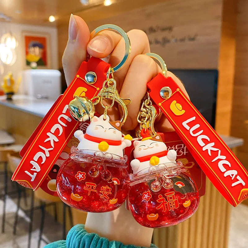 Floating Liquid Lucky Cat Bottle Keyring Cartoon Cute Lucky Cat Doll Key Chains Women Couple Charm Bag Pendant Car Key Ring