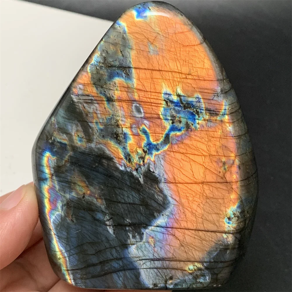 

Bright Natural Warm Orange Light Labradorite Ornaments Tirangle Purple Light Labradorite Mineral Specimen Palm Stones Heal Beads