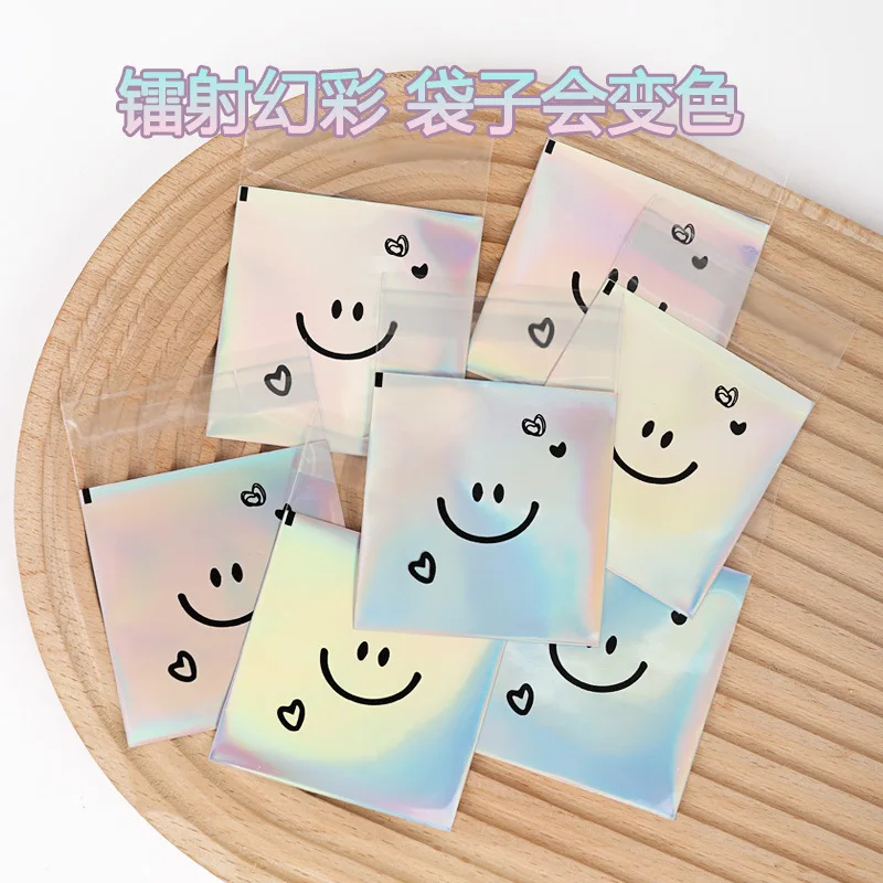 100pcs Snowflake Crisp Cookie Packaging Bag Cute Smiling Face Self-adhesive Bag Laser Transparent Biscuit Bag