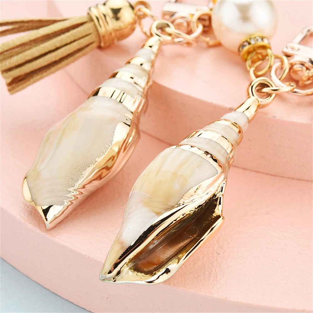 Luxury Pearl Conch Keychain Metal Bell Pendant Keyring for Women Purse Headphone Case Accessorie Bag Ornament Jewelry Gift