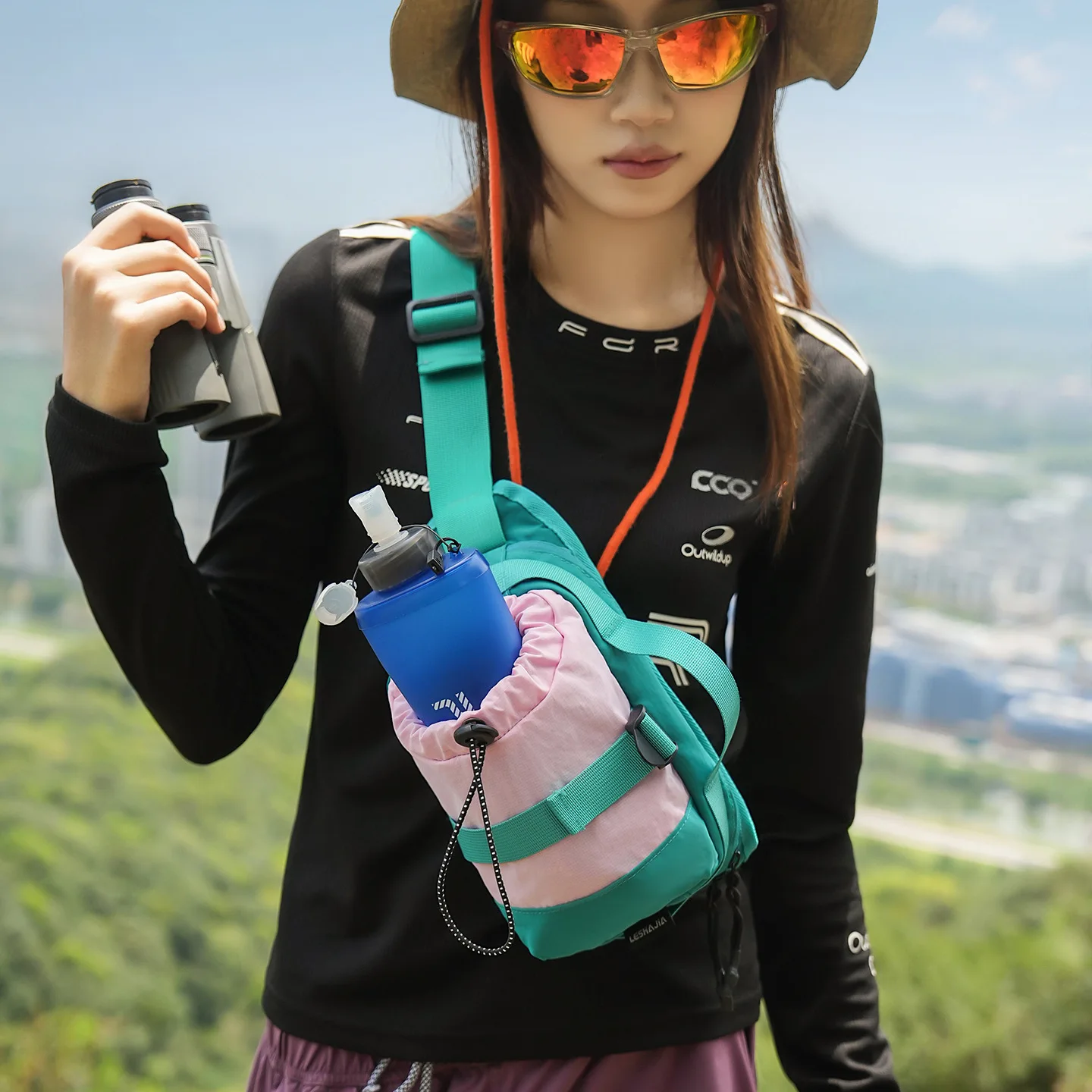 Outdoor sports water bottle crossbody bag, nylon fabric color-blocked drawstring opening, hiking chest bag, storage waist bag