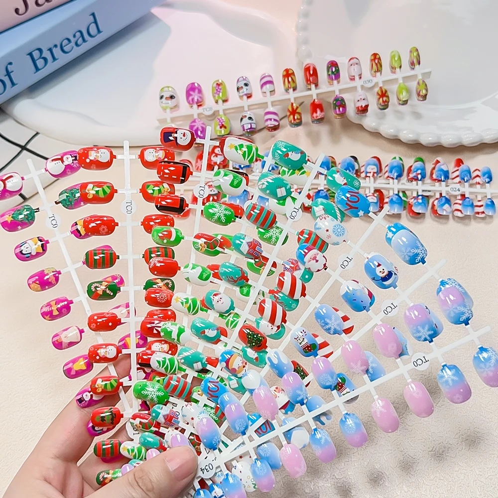24 pezzi ragazza carina Natale bambini unghie finte 6-14 anni bambini indossabili unghie punte pupazzo di neve Babbo Natale fiocco di neve Natale stampa OnNail