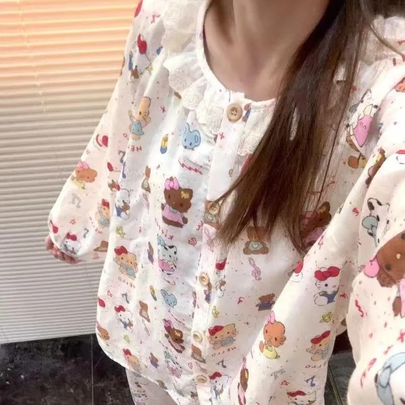 

Hello Kitty Women's All-Over Print Cotton Gauze Pajama Set,Long Sleeve Top Pants, Lace Trim Loungewear Soft Casual Sleepwear