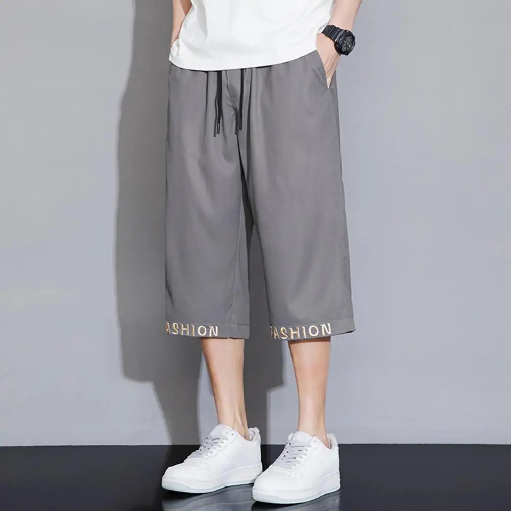 

Casual Style Cropped Pants Stylish Men's Cropped Pants with Elastic Waistband Drawstring Featuring Letter Embroidery for Casual