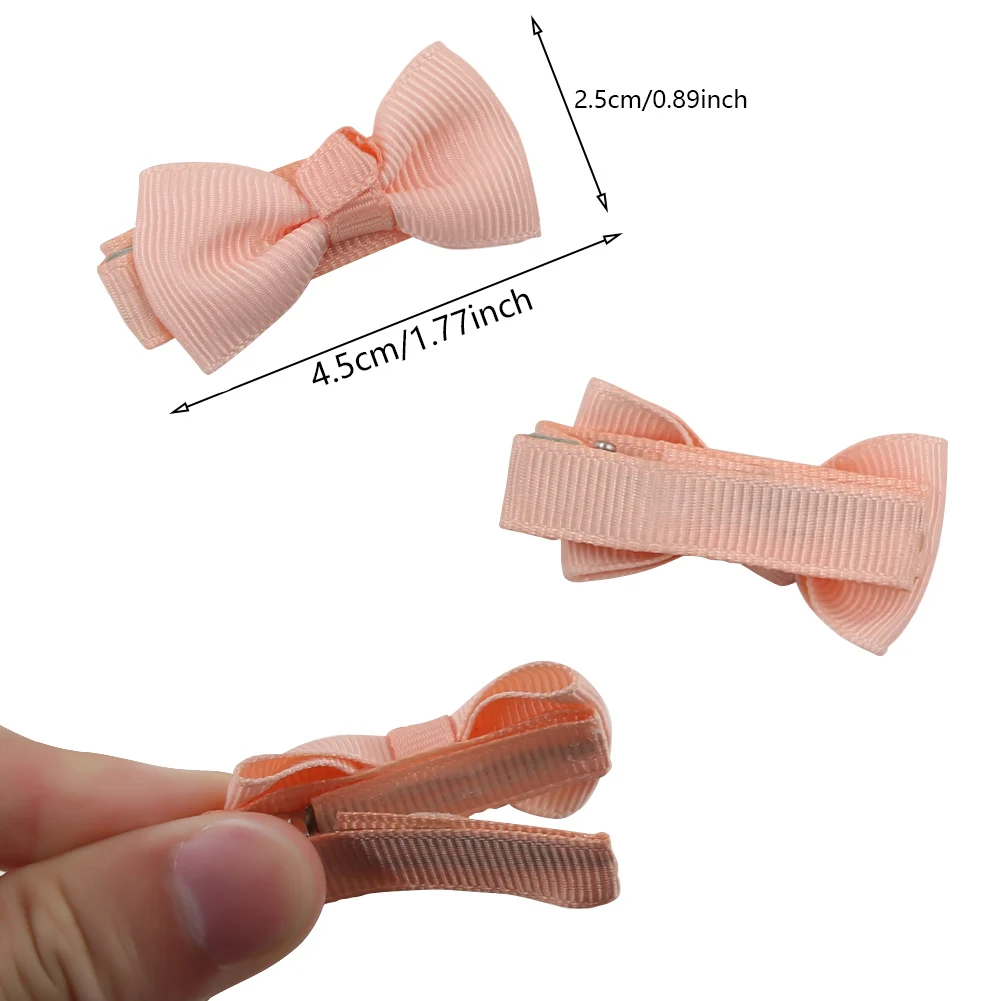 12 Pz/lotto 4.5 centimetri Solido Nastro Del Grosgrain Bowknot Bambini Pinze Archi Fatti A Mano Neonate Barrettes Forcelle Foto Puntelli Regalo Set