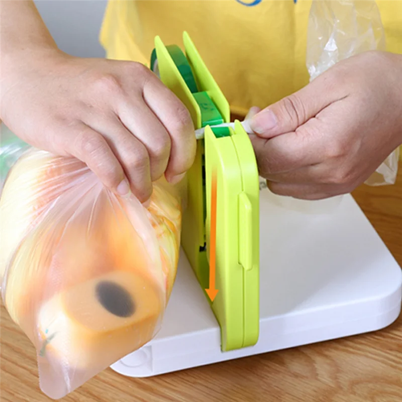 เครื่องปิดผนึกขนาดเล็กพกพาสะดวกมีคลิปความร้อนใช้ในครัวเรือนเครื่องปิดผนึกถุงขนมขบเคี้ยวที่บ้านเครื่องใช้ในครัว Gadget สีแดง