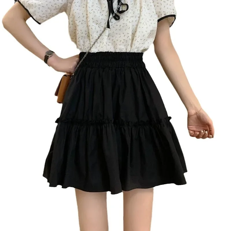 بالإضافة إلى حجم المرأة الأبيض مرونة الخصر ألف خط تنورة الصيف تنورة قصيرة تصميم غير متناظرة التنانير لون نقي للنساء