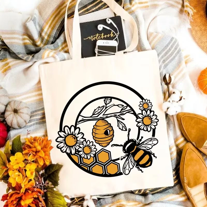 

Aesthetic Honey Bee Canvas Tote Bag, a Distinctive Present for Bee Enthusiasts, Gardeners. This Spacious And Stylish Handbag