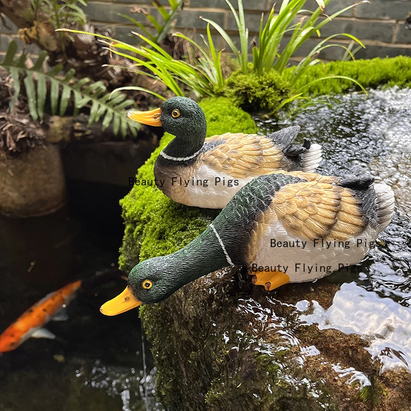 

Two resin ducks drinking water ornaments courtyard rockery landscaping fish pond water tank craft decoration