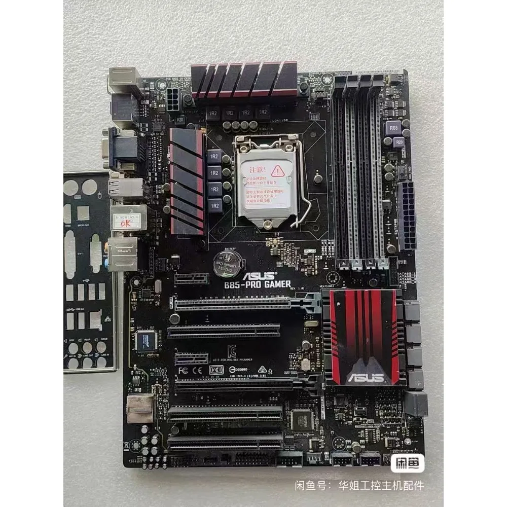 Carte mère ASUS B85-PRO GAMER, socket LGA1150, compatible avec la mémoire DDR3. Quatre emplacements pour cartes mémoire, port HDMI.