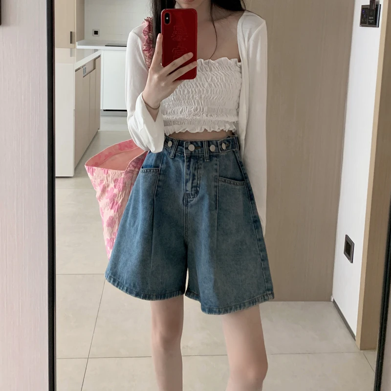 

Джинсы свободного кроя с высокой талией. Женские тонкие джинсы пять четвертей. Летние джинсовые брюки с высокой талией. Широкие шорты.