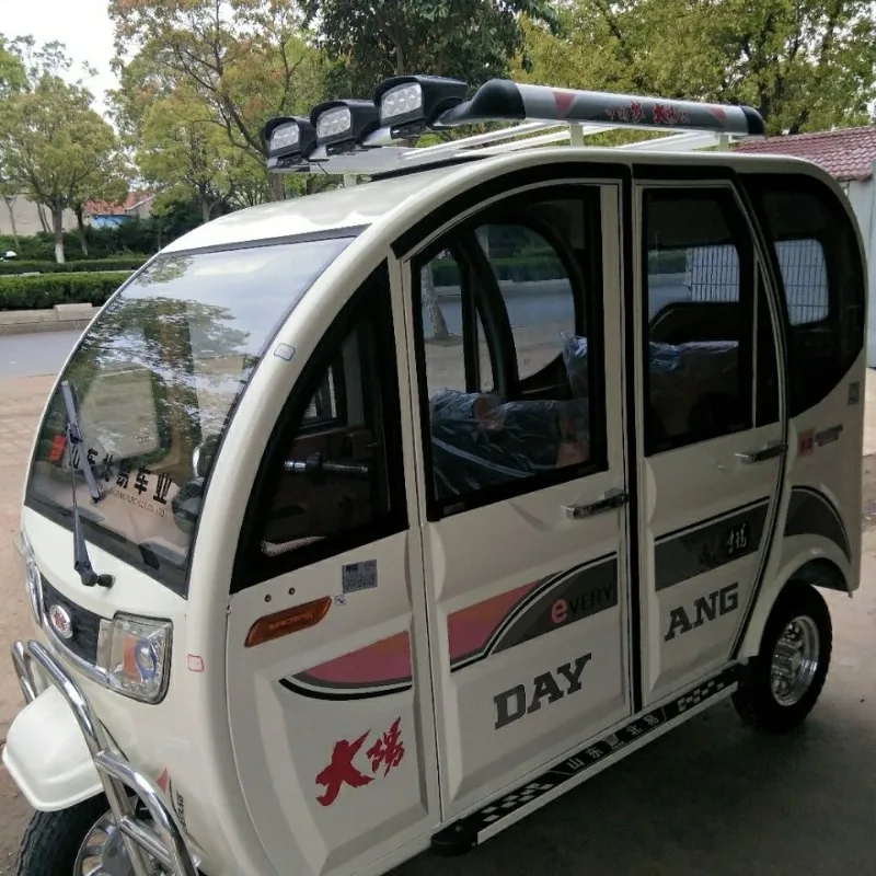 

Fully enclosed electric tricycle passenger and cargo battery car