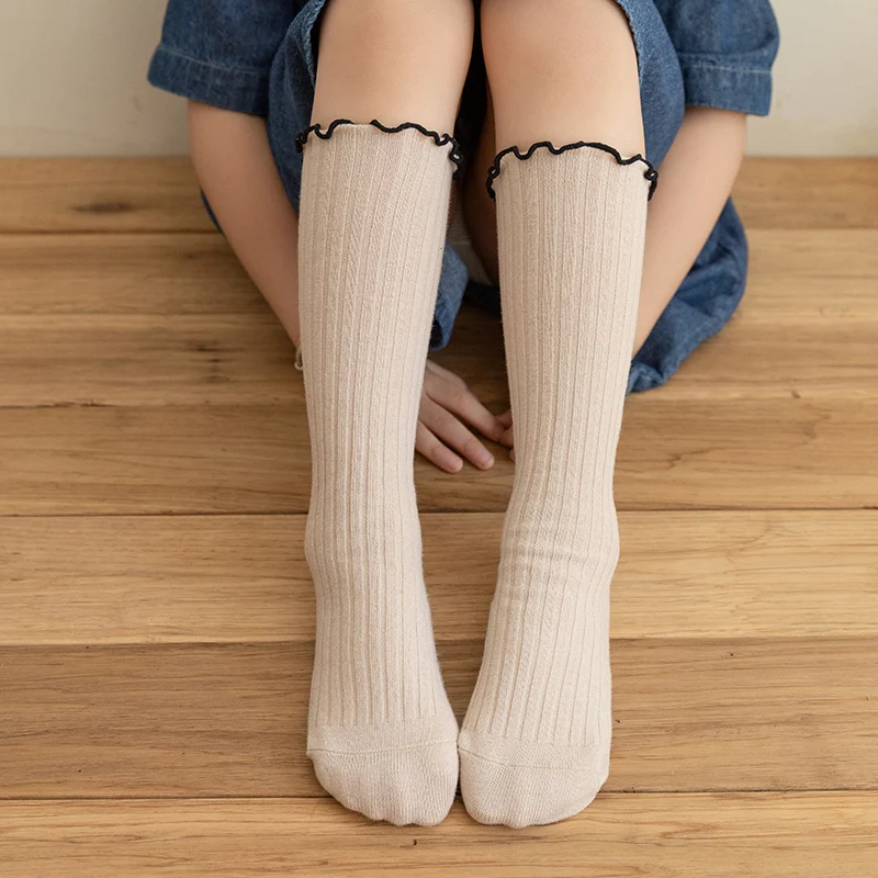 

Three pairs of girls' autumn and spring soft and skin-friendly socks with cute ruffles and straight legs