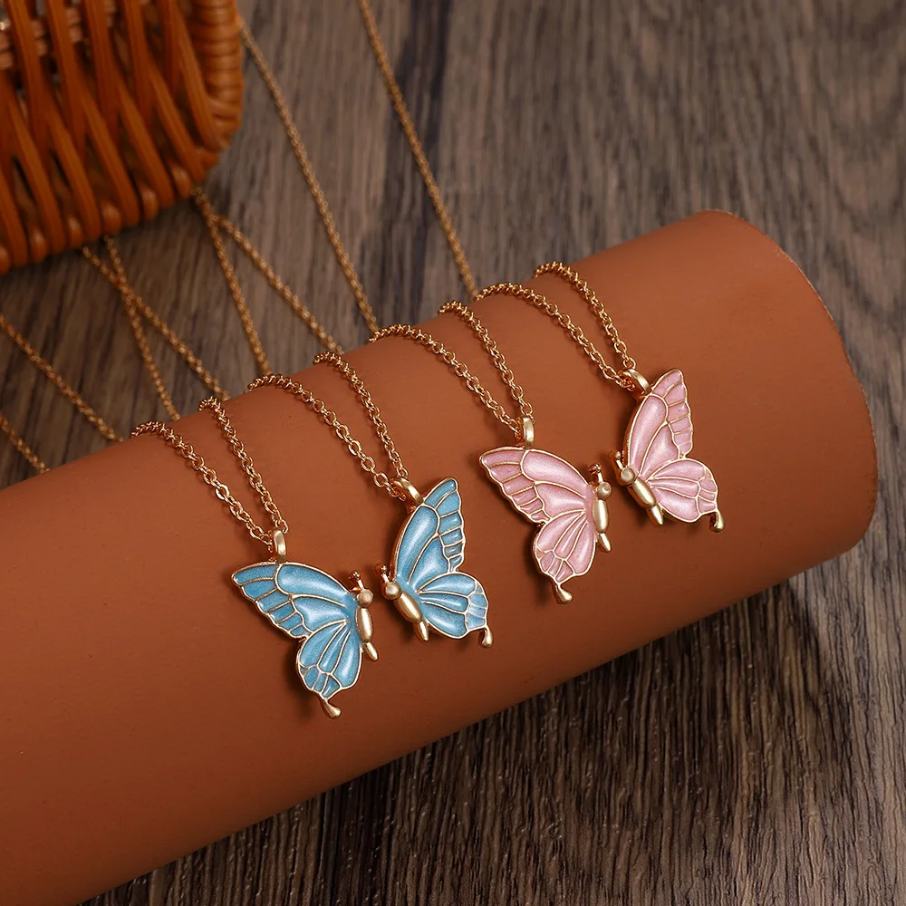 Collier double papillon goutte d'huile, ensemble d'amitié papillon créatif, chaîne de clavicule, cadeau pour petite amie