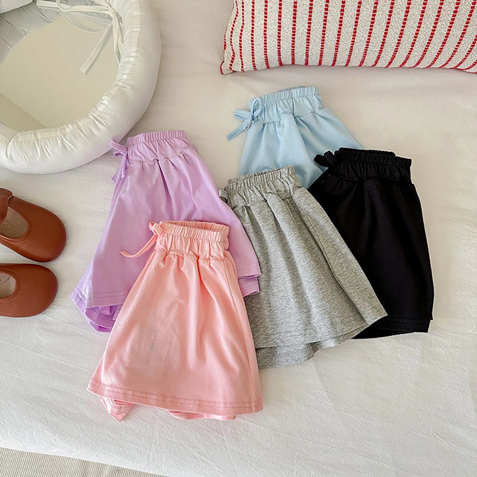 

Балетная юбка из мягкой ткани для маленьких девочек, шорты с эластичной резинкой на талии для девочек, детская полуюбка с бантом, летние детские однотонные короткие штаны