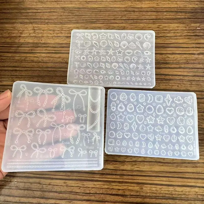 Silikon-Nagelkunst-Stempelform mit Motiven wie Meeresmuscheln, Seesternen, Mond und Schleifen, langlebig für DIY-Nageldekorationen zu Hause und im Nagelstudio. – Detail 3