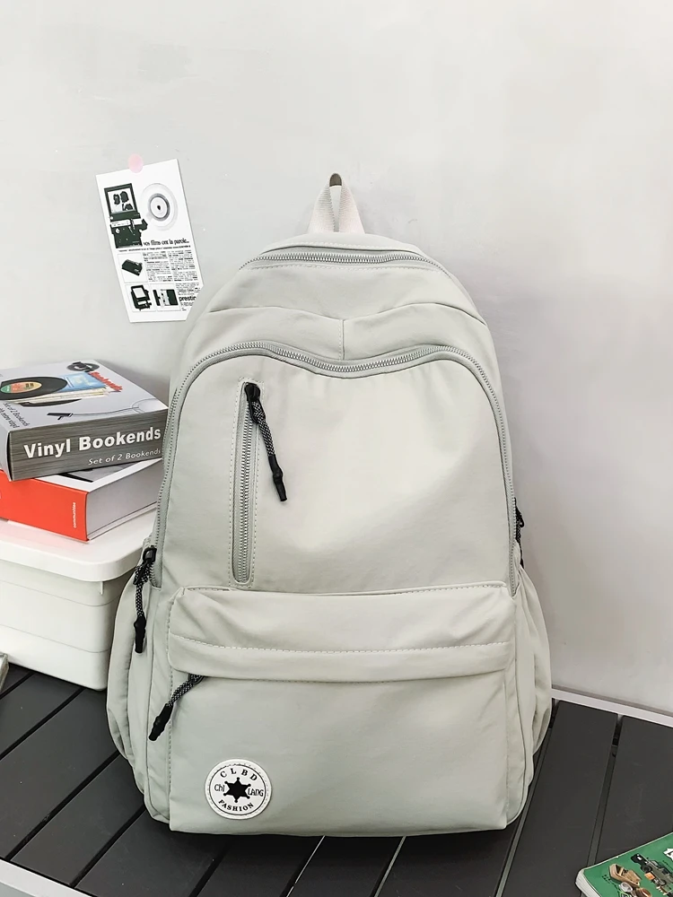 Mochila escolar de nylon impermeável, grande capacidade, zíper liso, cor sólida, mochila casual para adolescentes, fonte do estudante