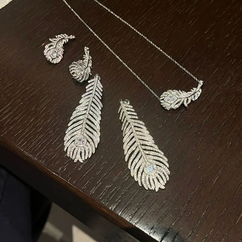 925 sterling silver fashionable and high-end feather ring, exquisite diamond-encrusted elegant necklace, and earrings set