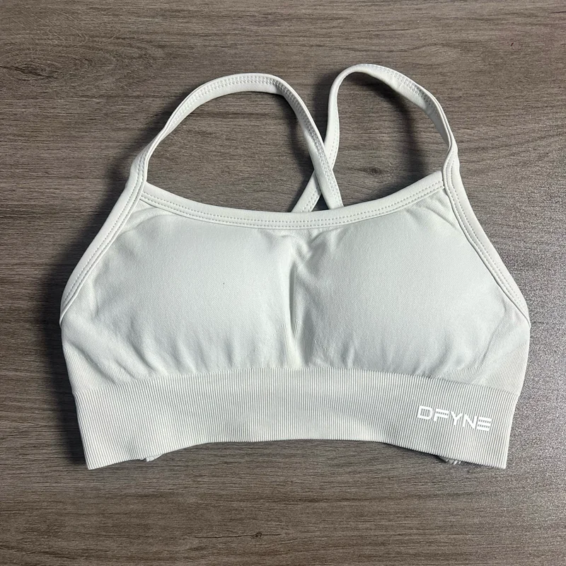 Dynamischer rückenfreier Sport-BH mit Logo, nahtloser Yoga-Top-BH für Damen, mittlere Unterstützung, gepolstertes Gym-Crop-Top, dehnbares Fitness-Sport-Top