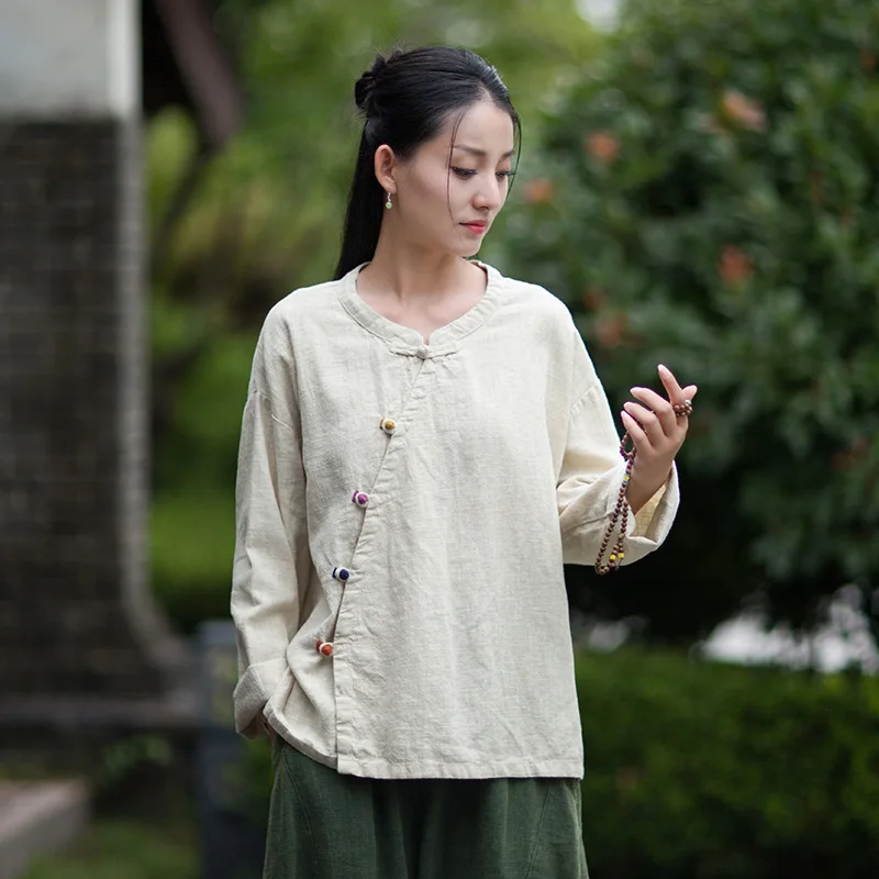

Serene Zen Tea Shirt: New Chinese style ramie top with an elegant diagonal frog-button closure.