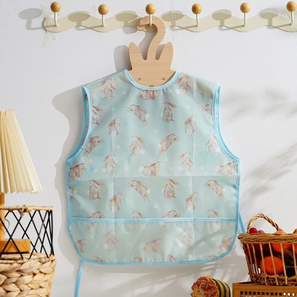Waterproof Baby Feeding Bib Sleeveless Design Cartoon Print Kids Smock Bib Food Catcher Pocket Lightweight Fabric