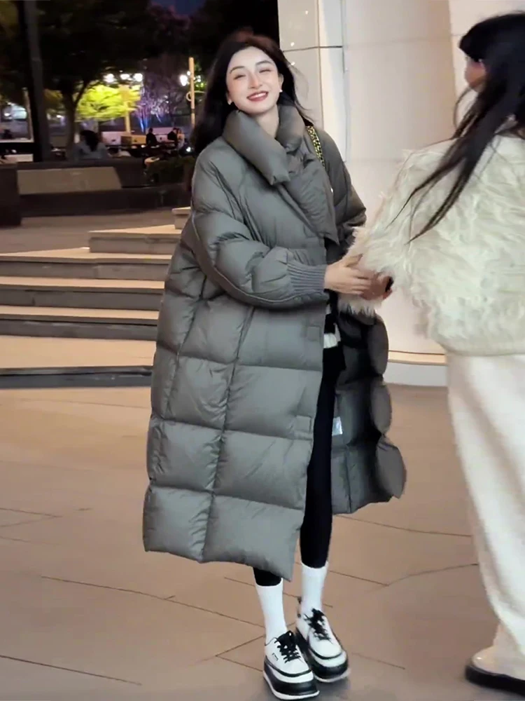 

2024 Winter New Faion Thiened Warm Stand Collar Bread Du down Jaet Women's Long Sle Commute Sle Du Feather Coat