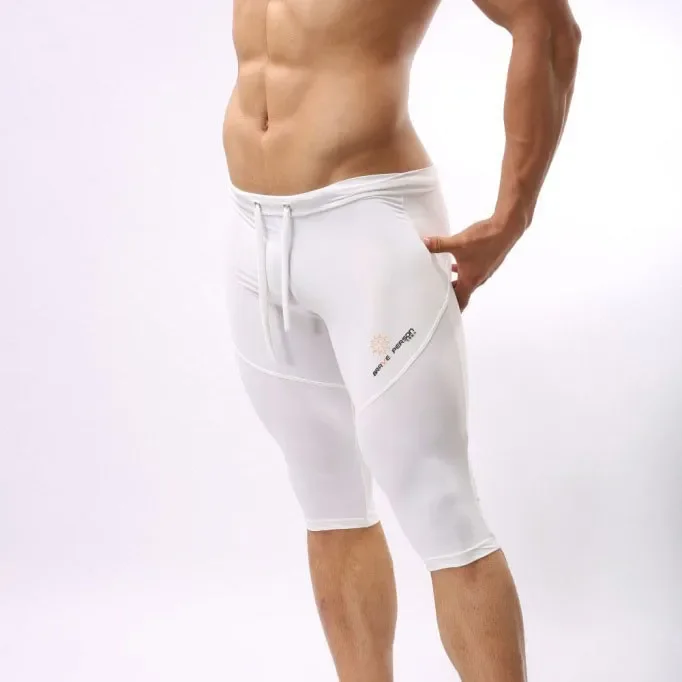 Collants elásticos dos homens, Shorts de compressão sólida, comprimento do joelho, boxer masculino sexy, corredores longos, roupas masculinas