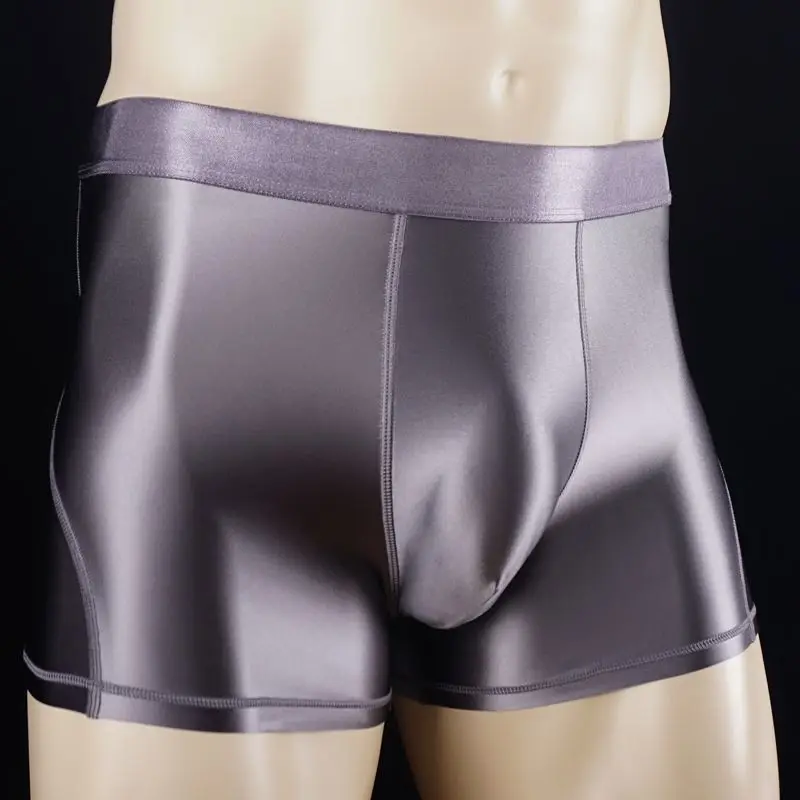 Calzoncillos elásticos para hombre, ropa interior Sexy de satén brillante con costuras, pantalones cortos deportivos ajustados