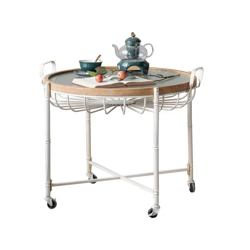 Side few carts, small coffee table mobile with wheels, small round table on the second floor of the restaurant