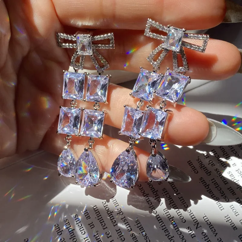 

MDL Moissanite Style Original Personalized Beautifully Crafted Drop Earrings, 18K Gold Plated, Fairy Style Bow Earrings.