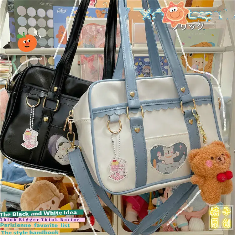 

Japanese Harajuku Cute Girl Student Handheld Jk Bag Korean Ins Soft Girl PU Leather Crossbody Bag Versatile Uniform Bag