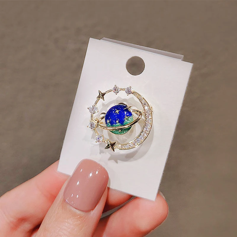 1Pcs Cute Blue Planet Enamel Brooches for Women 2023 New Trendy Shiny Rhinestone Lapel Pin Coat Scarf Fixed Accessories Badge