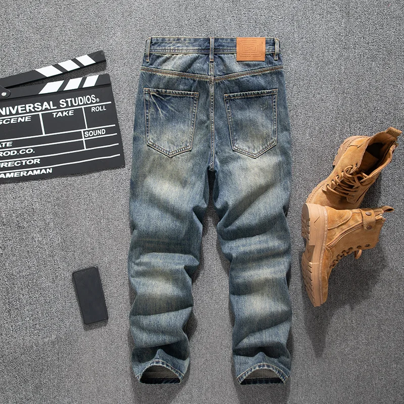 Jeans retrò da uomo a tubo dritto larghi alla moda primaverili ed estivi con fori strappati, giunture con toppe e pantaloni in denim patchwork