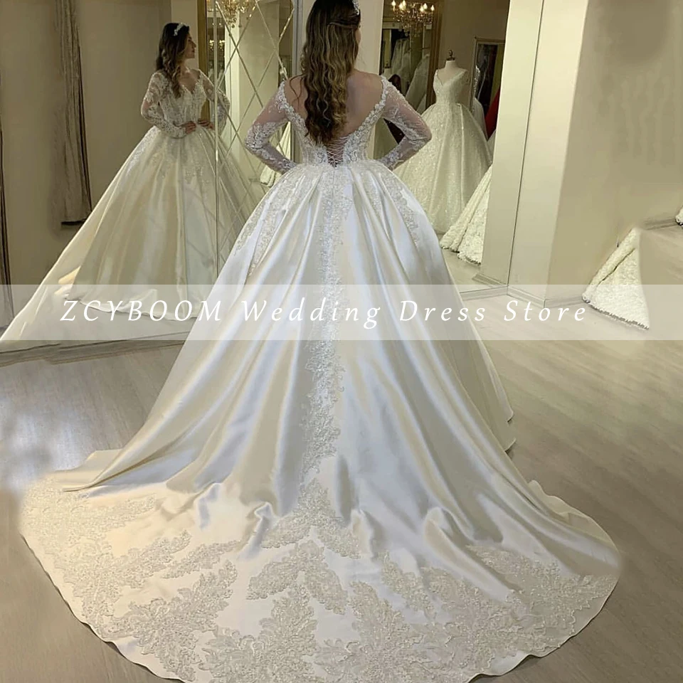 Personalizado com decote em v lantejoulas apliques sem costas mangas compridas vestido de casamento branco 2025 vestido de baile até o chão trem varredura vestido de noiva