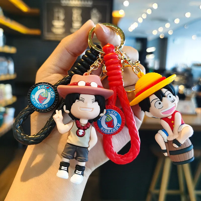 MINISO nuevo personaje de dibujos animados lindo y fresco Luffy Ace llavero pareja mochila coche llave colgante decoración de fiesta regalo para niños