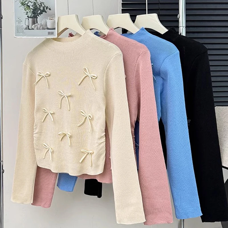 Maglione lavorato a maglia a maniche lunghe a collo alto con fiocco tridimensionale dolce coreano per le donne