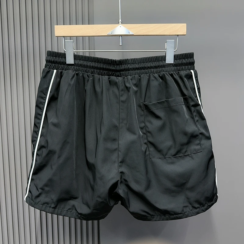 黒刺繍コスモススターリングバスケットボールショーツメッシュ速乾性 Jorts 男性女性ルーズ巾着ウインドブレーカースポーツショートパンツ