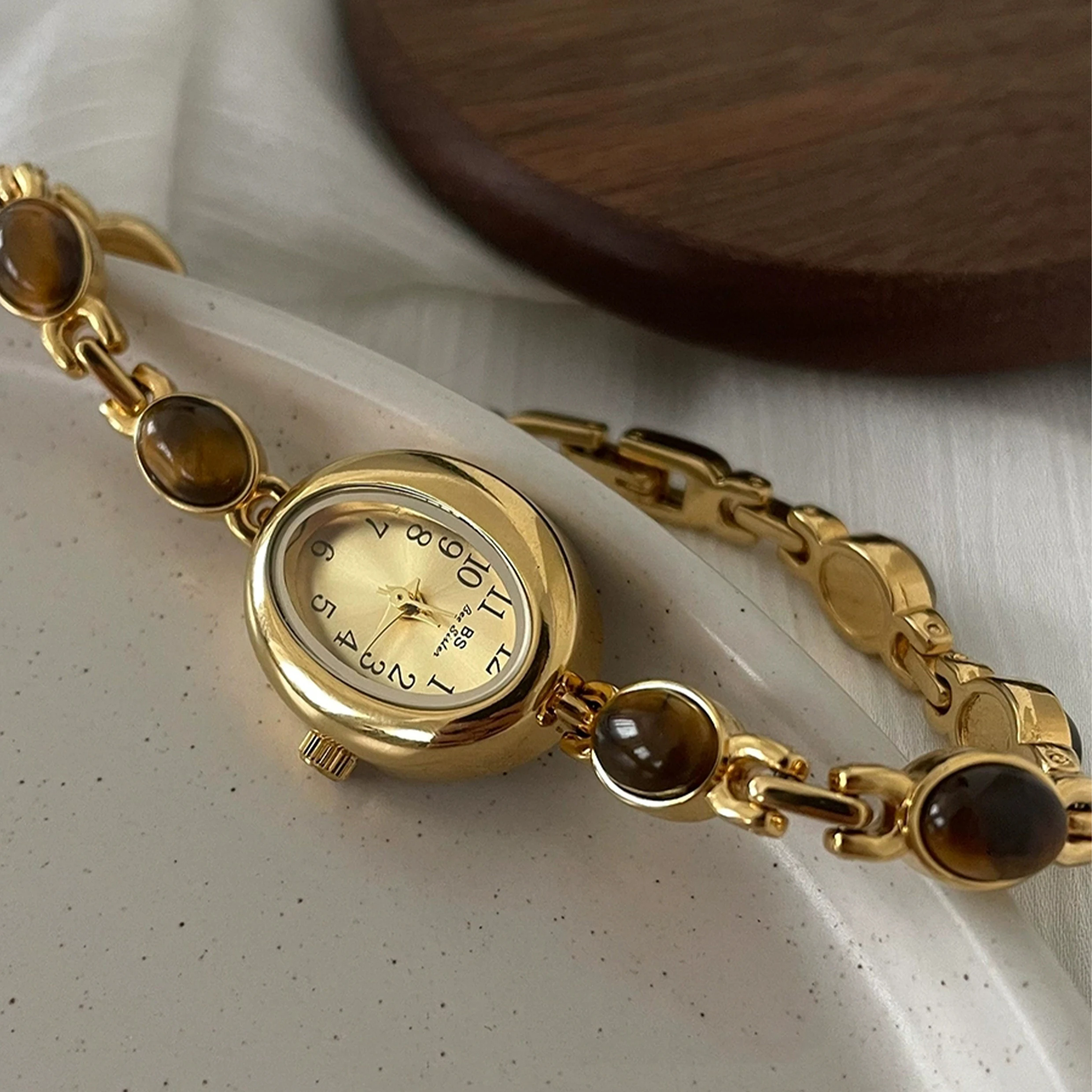 Relojes de lujo de alta gama para mujer, piedras preciosas de Esmeralda dorada, resistente al agua, ovalados, elegantes, de cuarzo, accesorios para mujer 2025