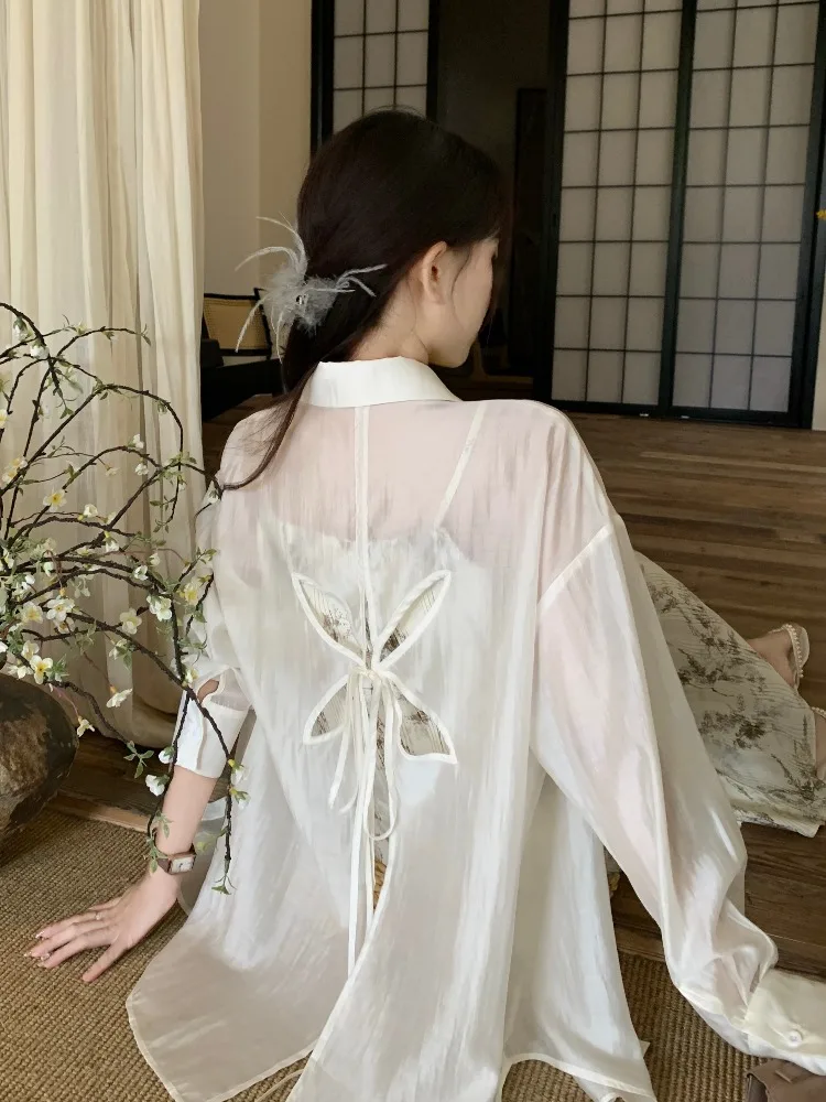 Femmes été 2025 nouveau noeud Sle évider Protection solaire irt léger en mousseline de soie vêtements d'extérieur Cardigan blanc