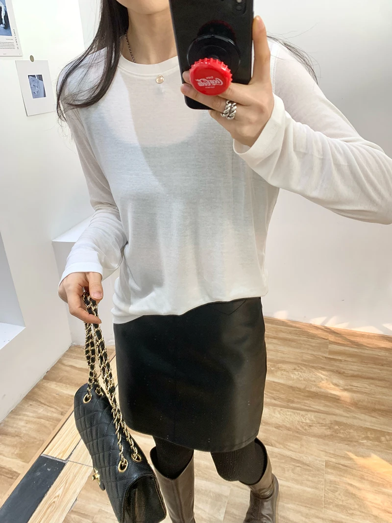 T-shirt ampia a maniche lunghe girocollo tinta unita casual da donna autunno e inverno