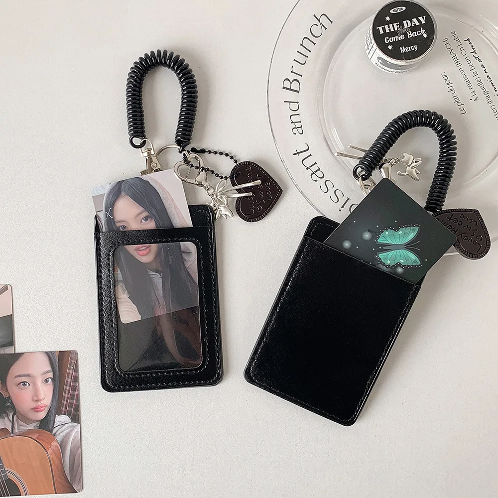 Women's Black PU Leather Photocard Holder with Clear Window and Heart Charm Spring Coil Keychain ID Card Case for Daily Use