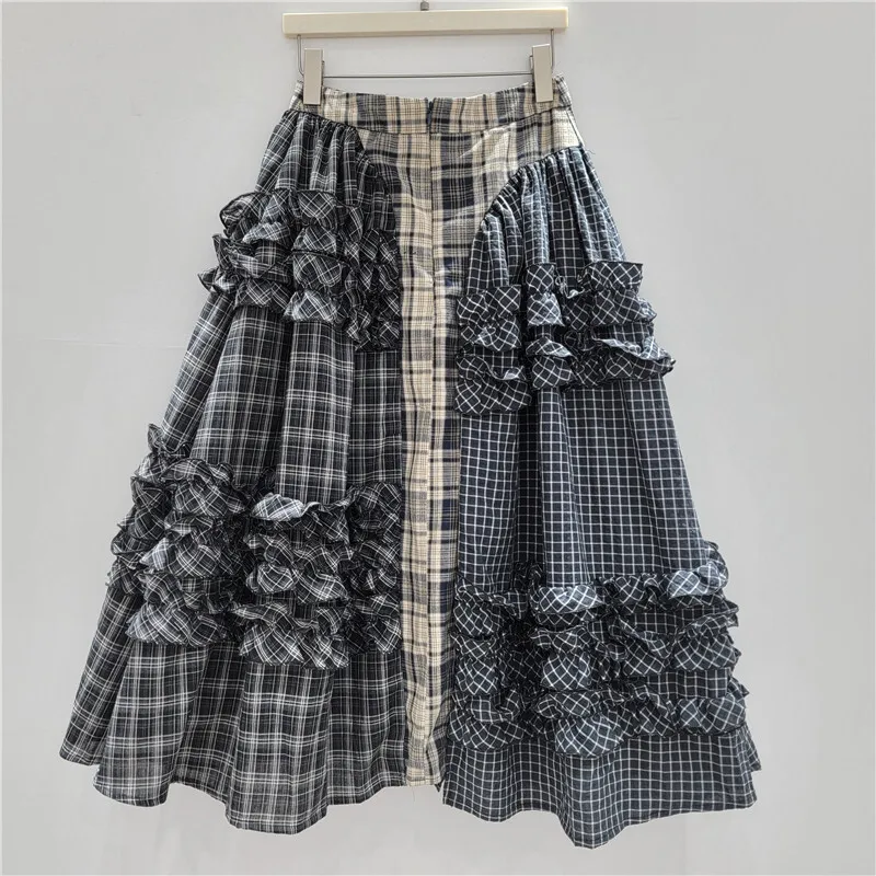 WTHT العصرية أزياء المرأة المرقعة تكدرت حافة منقوشة التنانير الطويلة 2025 ربيع جديد عالية الخصر ألف خط تنورة الإناث 1LS1217