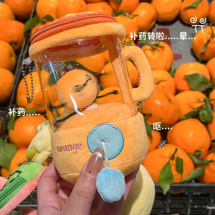 

Fruit juicer toy with fun drawstring and rotating plush toy