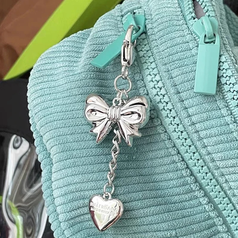 LLavero de aleación de plata Y2K para mujer y niña, colgante con forma de corazón, estrella, lazo, funda para auriculares de coche, accesorios colgantes para bolso