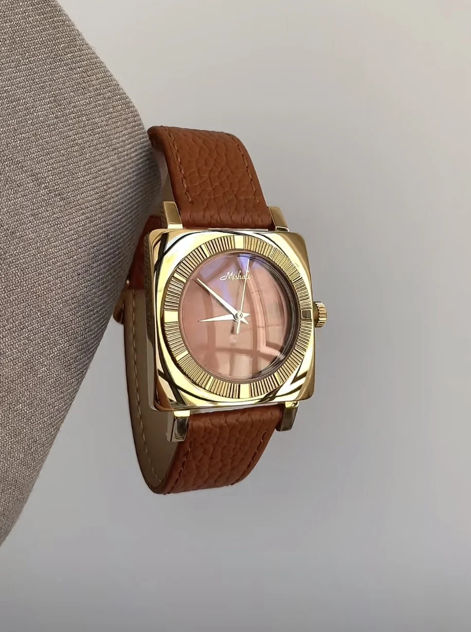 

A VintageInspiredMinimalistAnd Sophisticated Women'S Watch With A Large GoldTone Dial And Leather Strap Perfect For Any Occasion